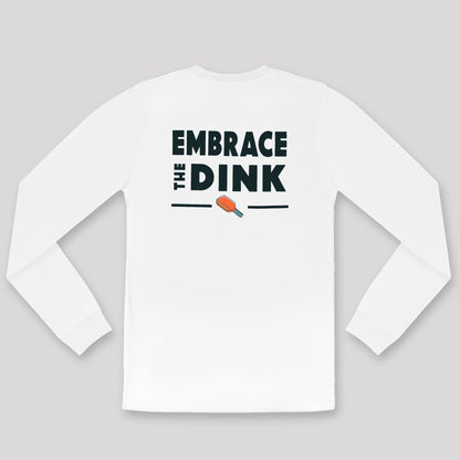 A flat lay of the Embrace the Dink long-sleeve pickleball shirt in White, featuring a lightweight design and bold Navy Blue graphic. This versatile piece of pickleball clothing is perfect for your next game or casual outing.