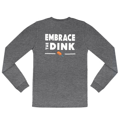 A flat lay of the Embrace the Dink long-sleeve pickleball shirt in Gray, designed for pickleball lovers. The breathable material and bold back design make it a must-have for your pickleball wardrobe.