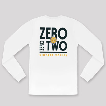 A flat lay of the Zero Zero Two Vintage Volley Long Sleeve Pickleball Shirt in White, highlighting its crisp and minimalist design. The shirt features bold Navy Blue text reading "Zero Zero Two," a vibrant yellow pickleball graphic integrated into the design, and the words "Vintage Volley" in bright yellow below. 
